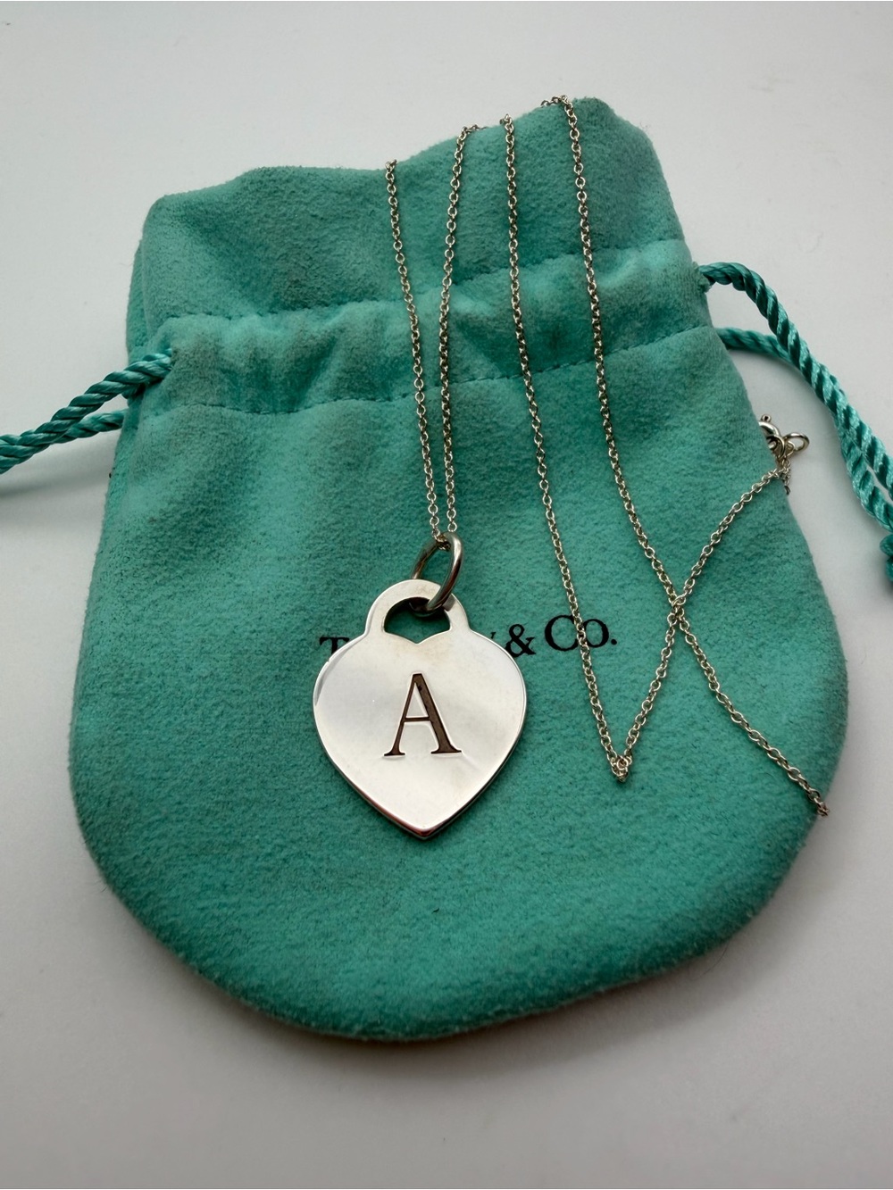 Tiffany & Co. 16” letter A medium heart with engraved earth on back